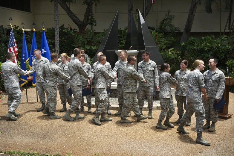 a group of people that are standing next to each other