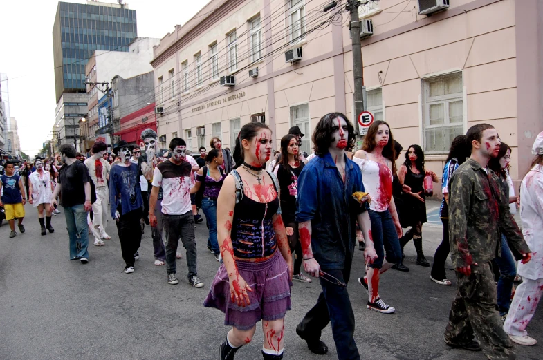 group of zombies walking through the streets in a parade