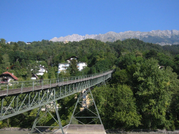 an elevated walkway on top of a mountain