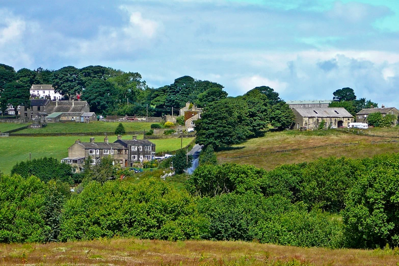 an old farm is next to a country house