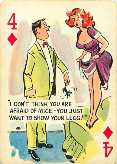 a playing card with a man and woman, both dressed up in suits and red hair