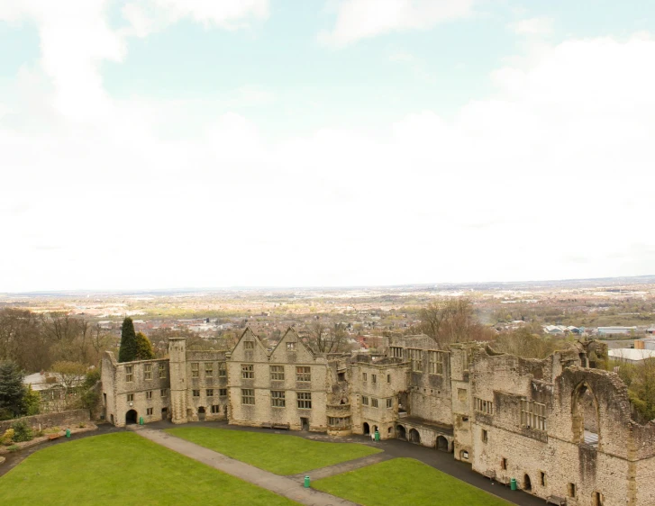 an aerial view of the ruins of a castle