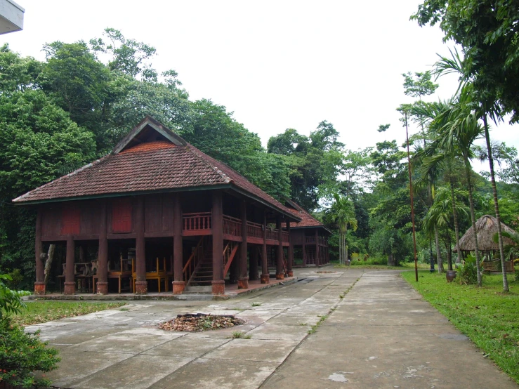 a wooden house with many porchs on the side