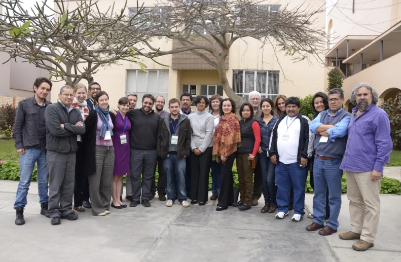 a large group of people gathered together for a picture