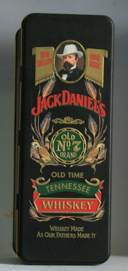 the back side of a jack daniels cigar tin