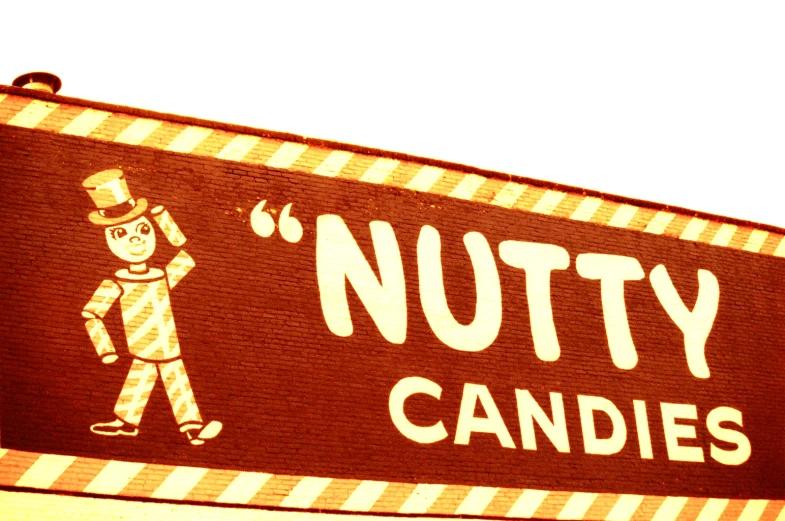 there is a sign that says nutty candies on it