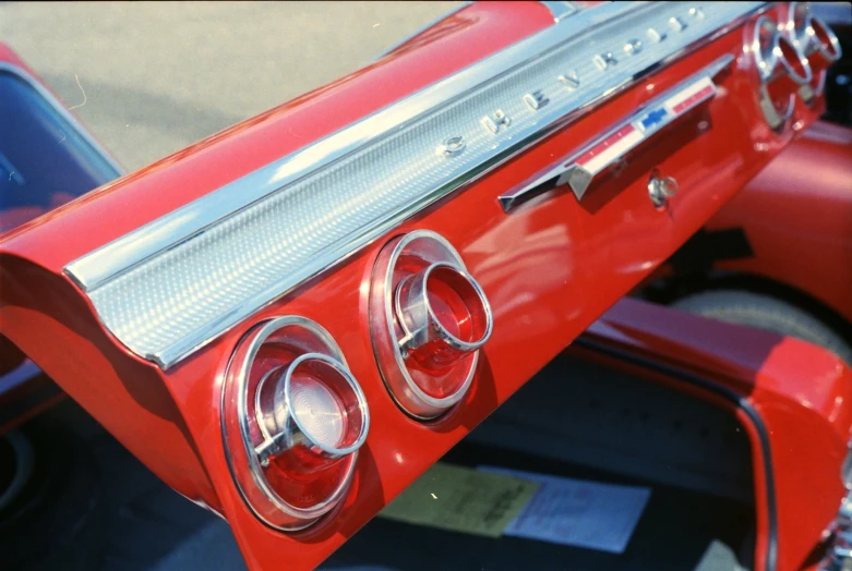 a close up of an old car's taillight