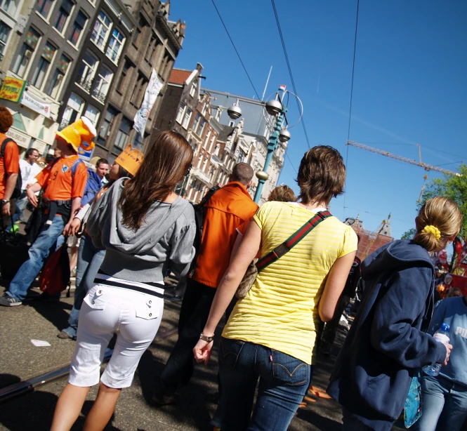 some people with various types of masks and wearing shorts