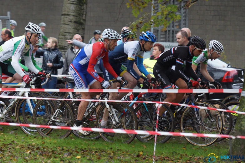 a bunch of bicyclists in a bike race