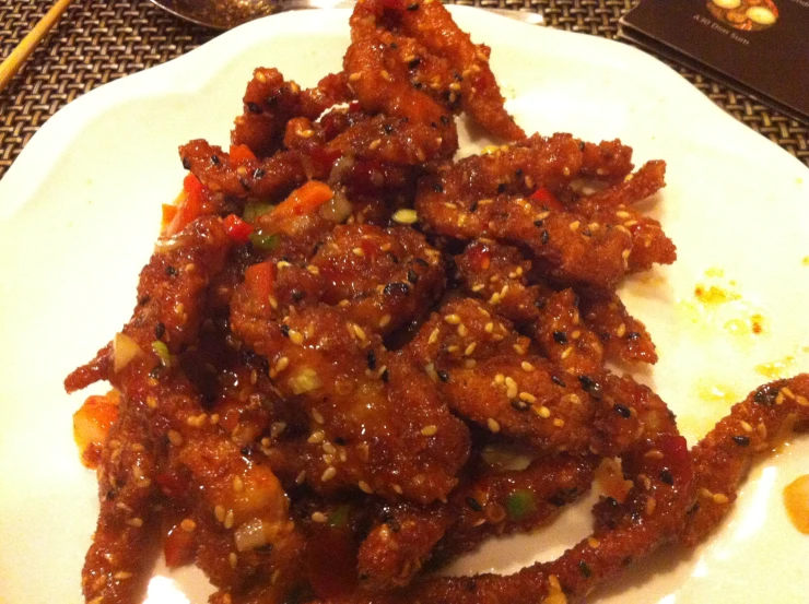 a plate of chinese food on a table