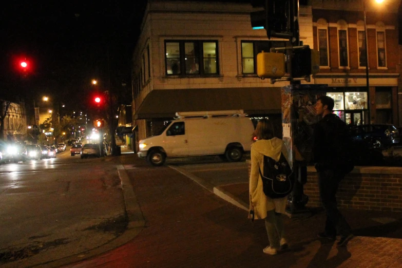 people standing at the intersection looking in each others eyes