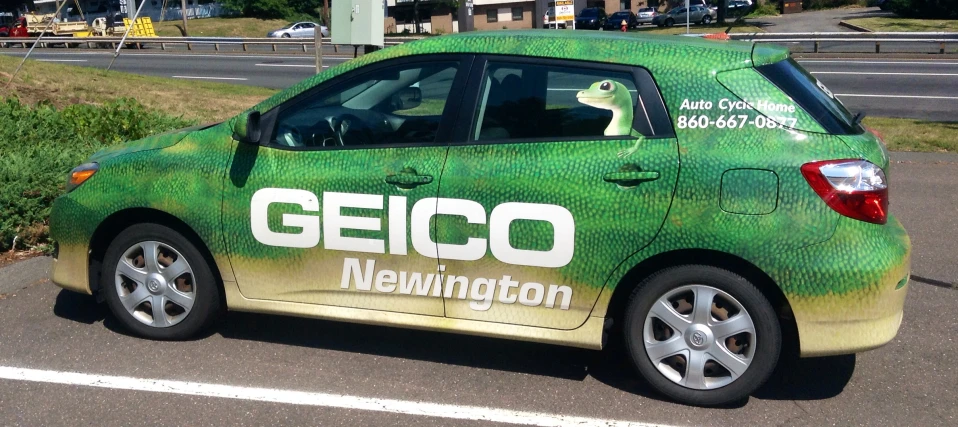 an advertising vehicle painted in green and yellow