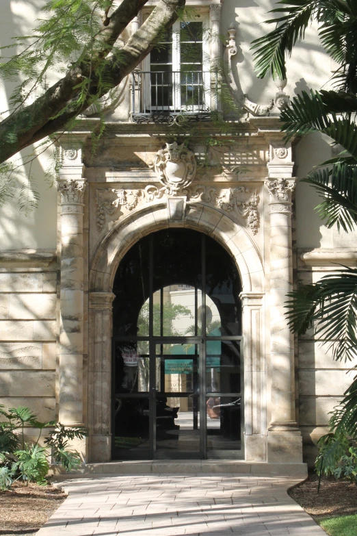 the building is in use during the day and has trees in front