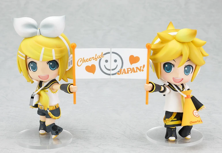 two anime figurines on a white background
