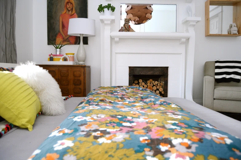 bedroom view of the fireplace with various decorations