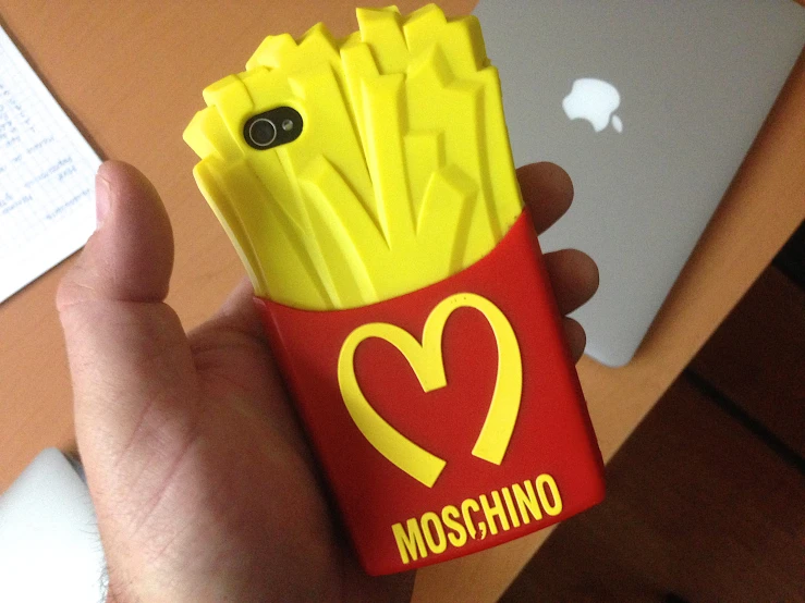 a cellphone case with some fries inside of it