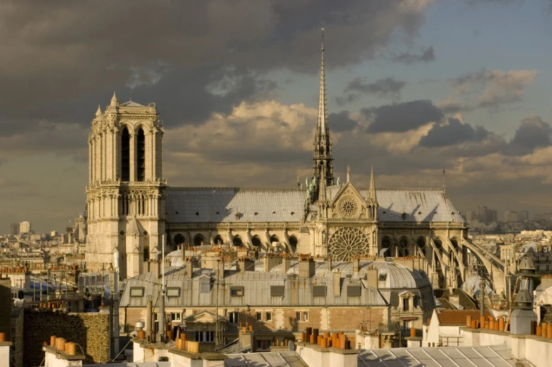 the city has large buildings and a cathedral in front of it