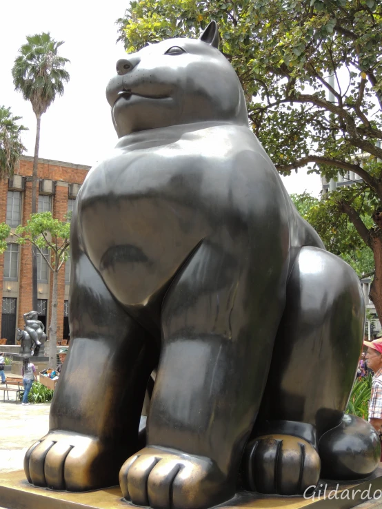 the statue of a large bear is on display