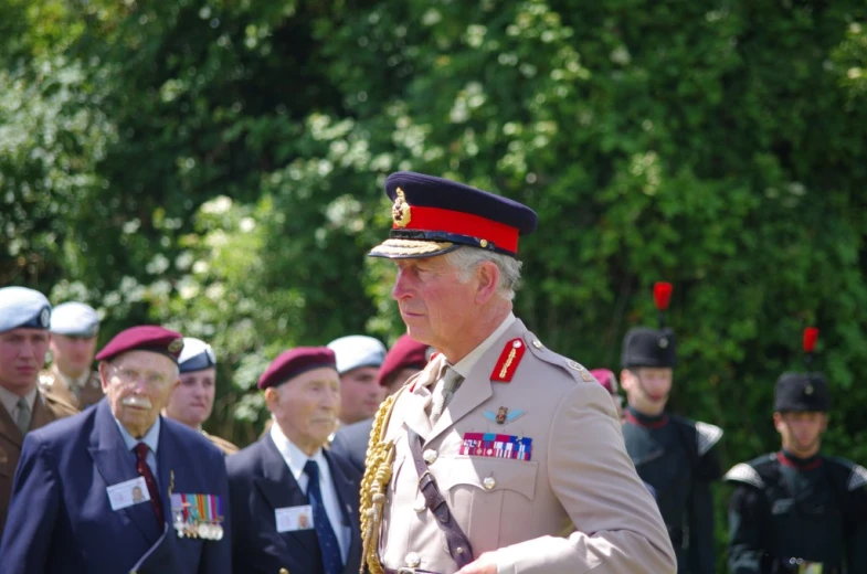 a group of men in uniform standing around