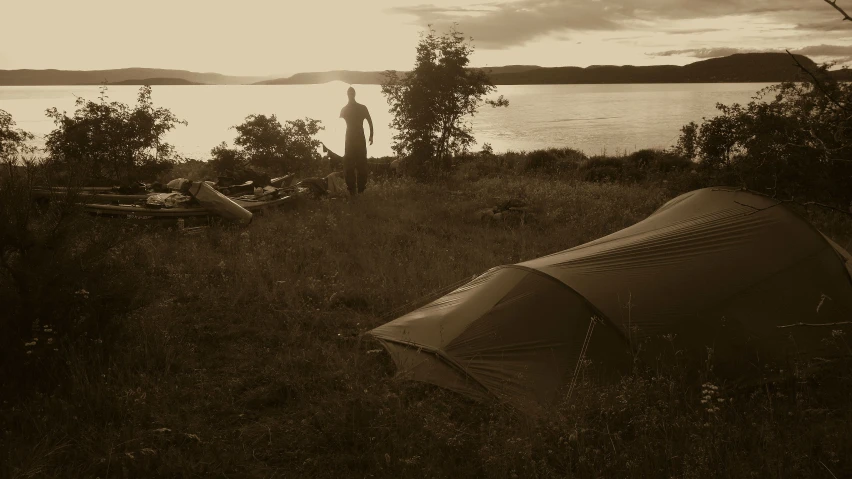 an image of a camping site overlooking a body of water