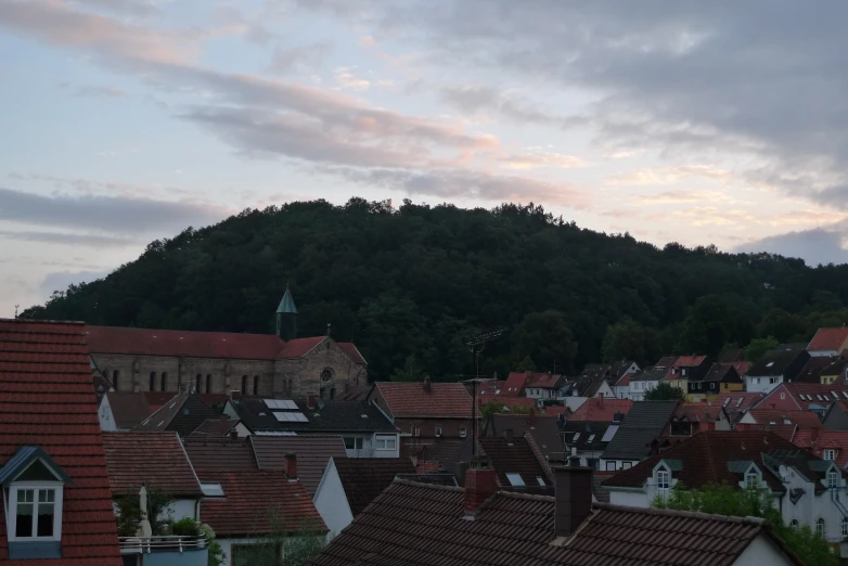 the village is near many hills and trees