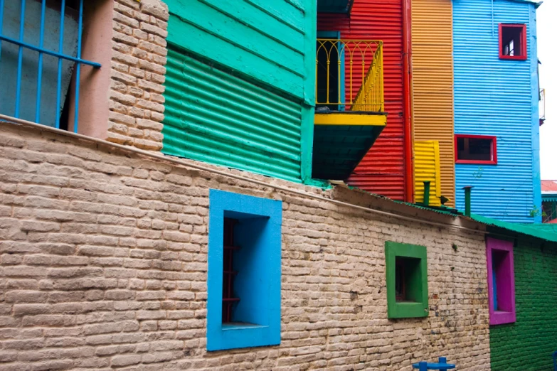 colorful buildings painted different colors with doors and windows