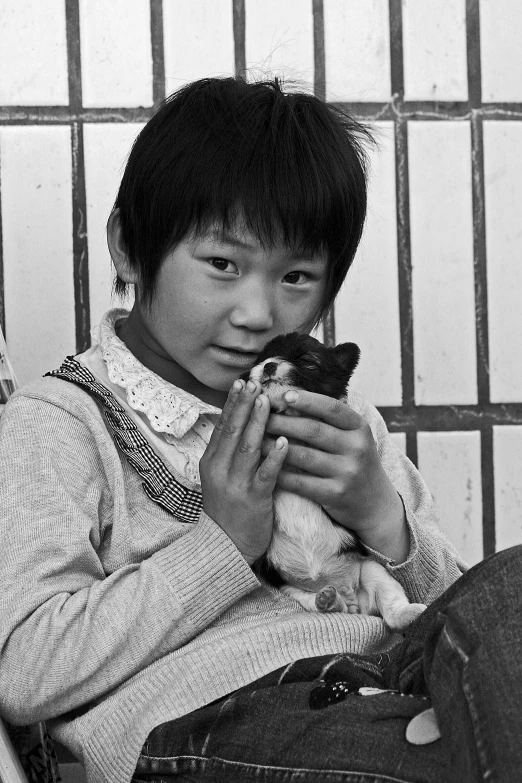 a man holding a teddy bear in his right hand