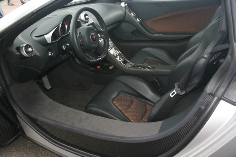 a small dashboard in the back of a silver car