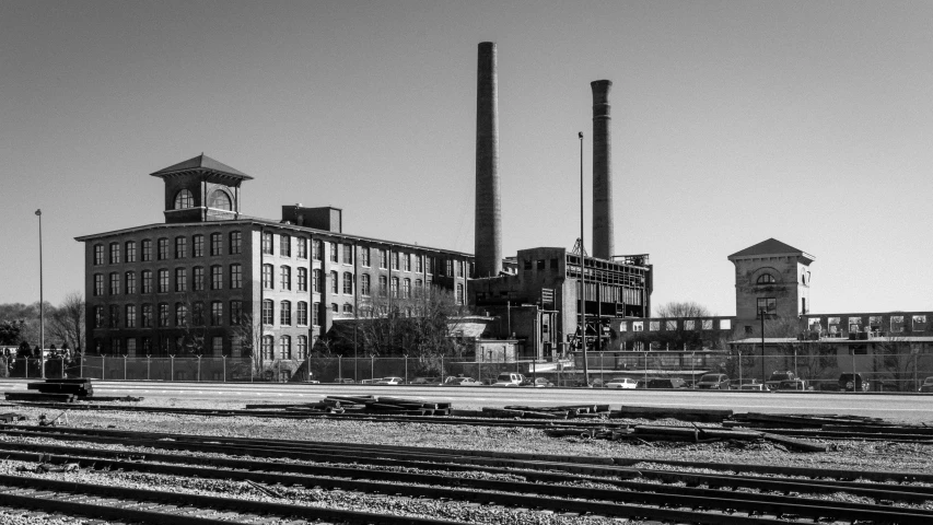 the factory buildings look very old and very deserted