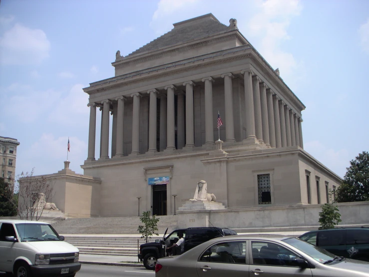 a tall building with columns on the sides