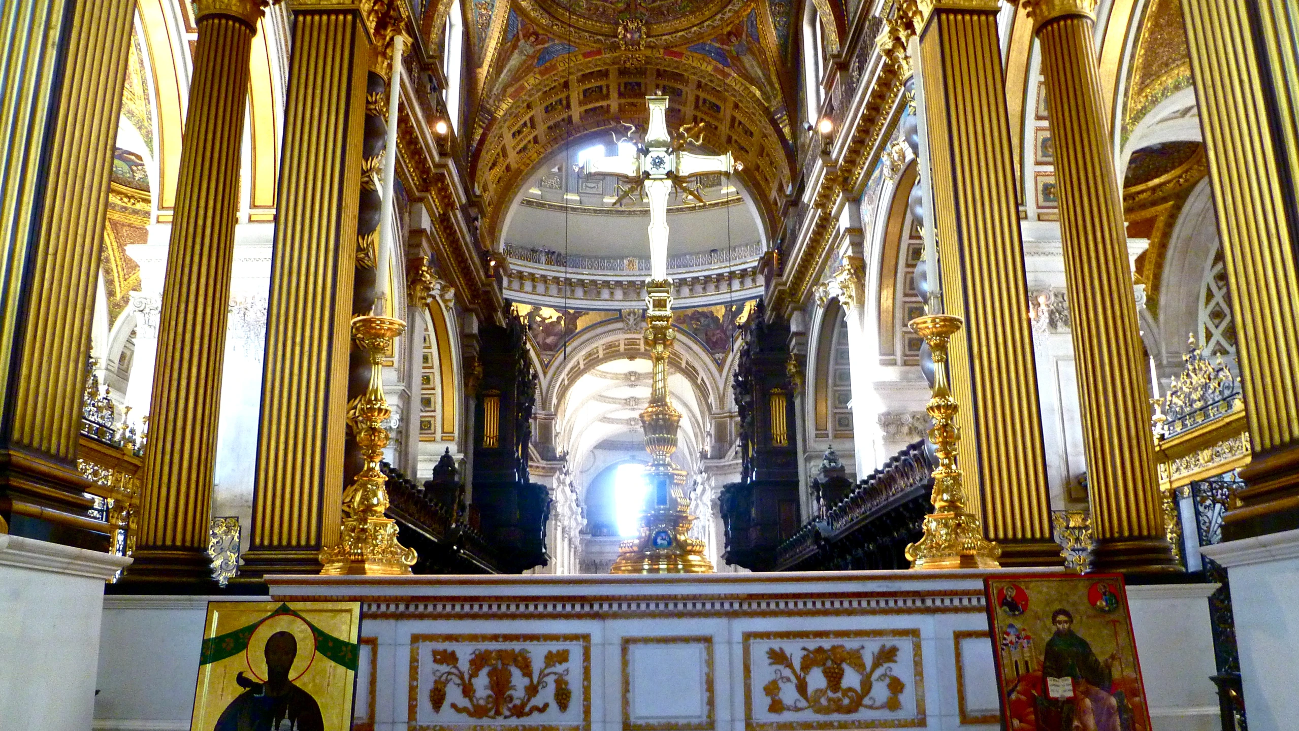 the interior of a church with yellow and white walls