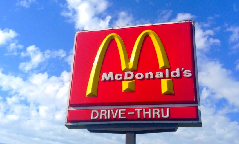 there is a large sign for a fast food restaurant