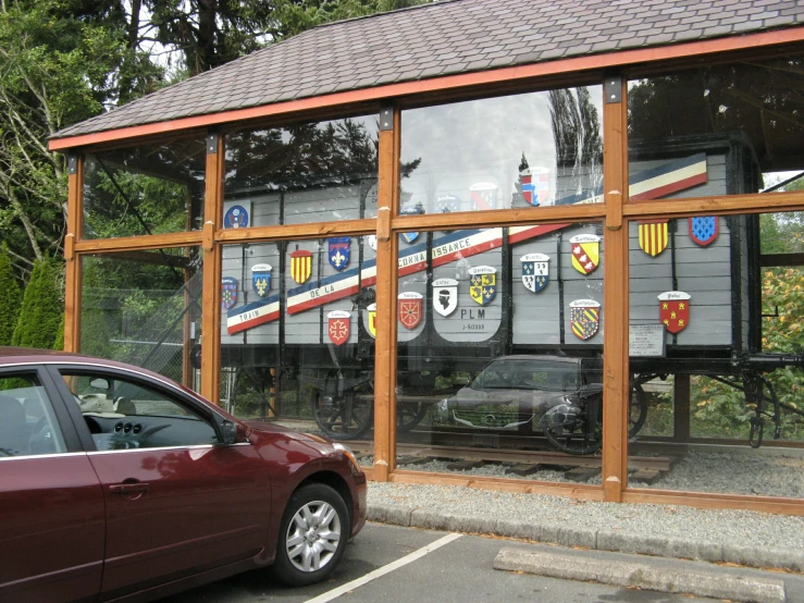 an image of a vehicle parked outside of a building