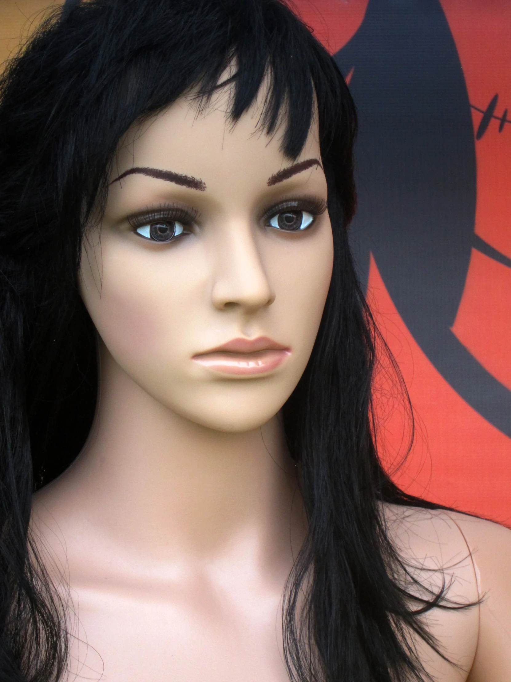 an image of a wig head on display for sale