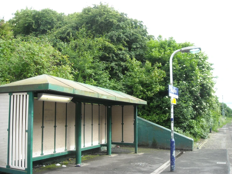 the empty restrooms are located on the side of the road