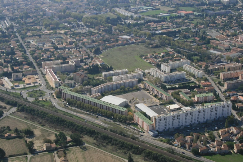 a very big town is next to some houses