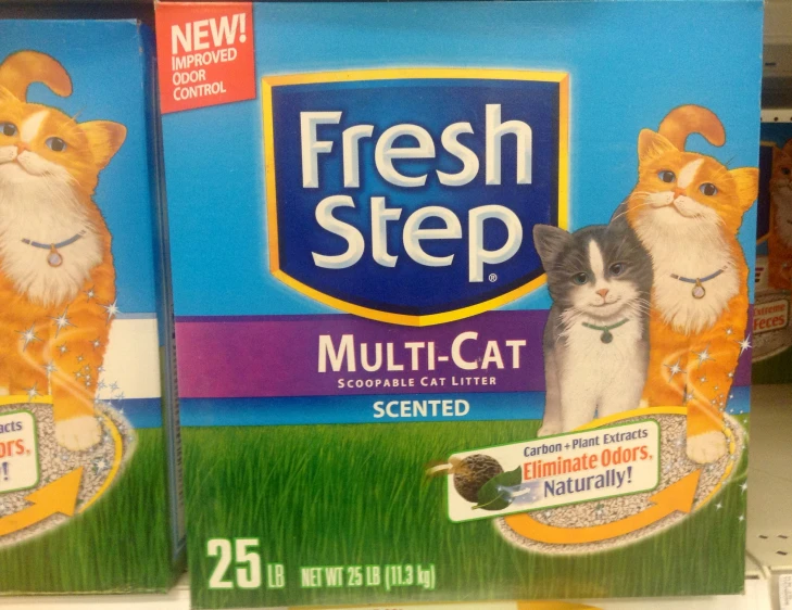 three boxes of fresh step cat litter sit next to each other