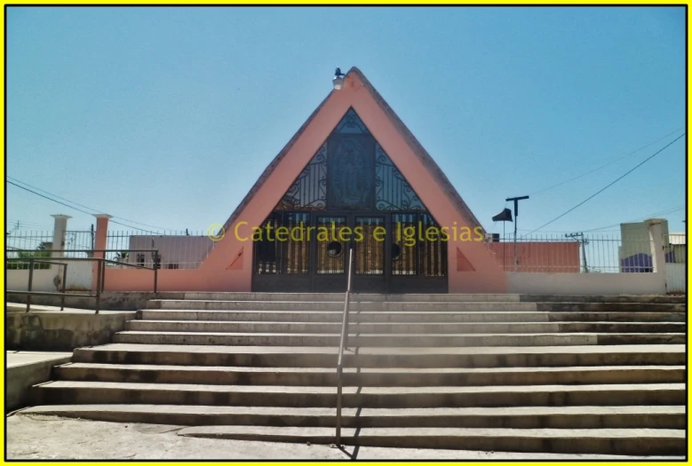 a building with steps leading up to it and a sky background