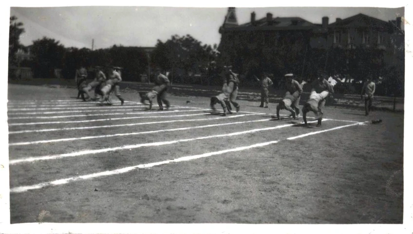 a group of people run on a baseball field