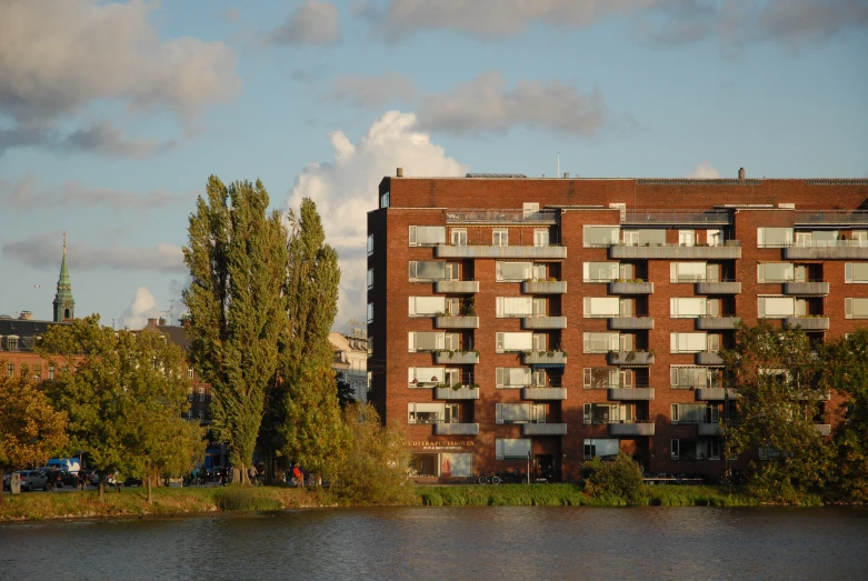 a large red brick building in the background