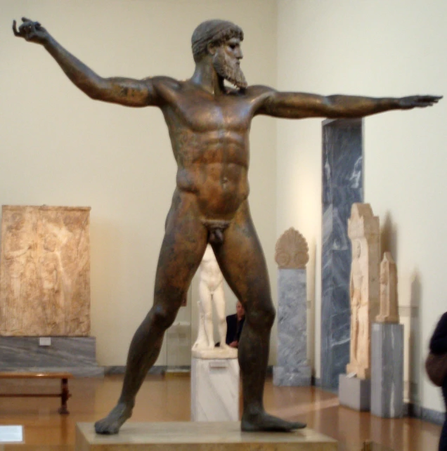 there is a bronze statue that looks like it has no arms