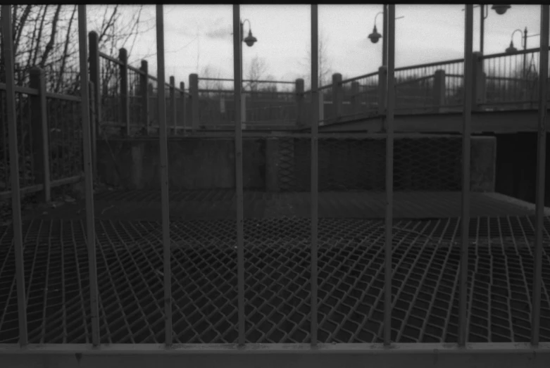 black and white pograph of a prison cell