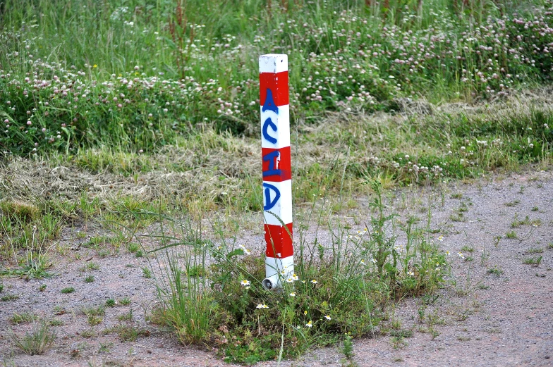 there is a street sign posted on a pole