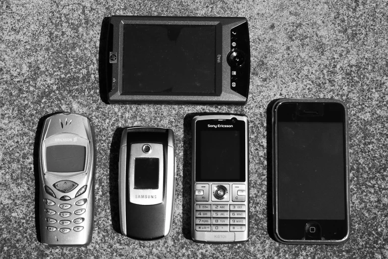 several cell phones are next to each other