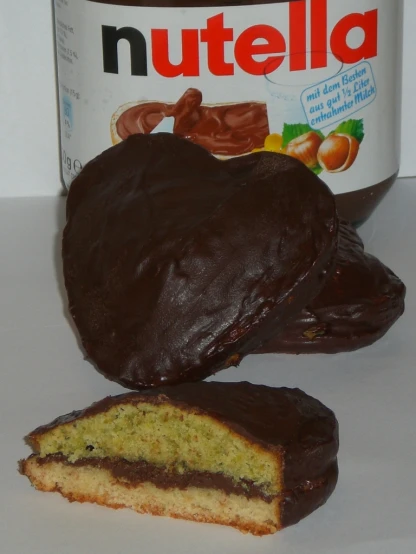an oreo cookie and half eaten nutella jar