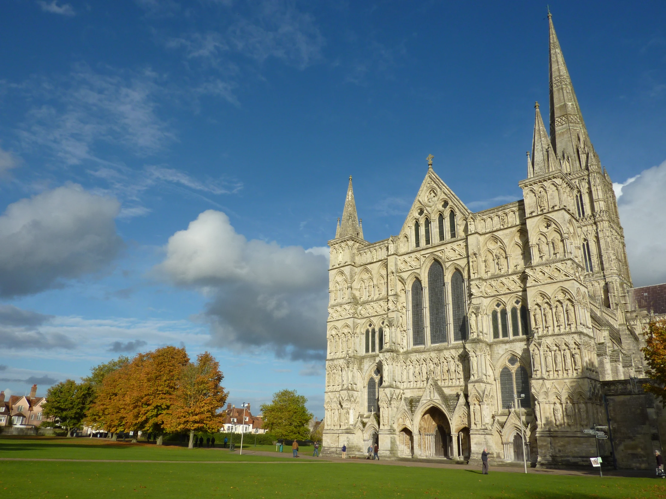 an old building with a very tall cathedral on top of it