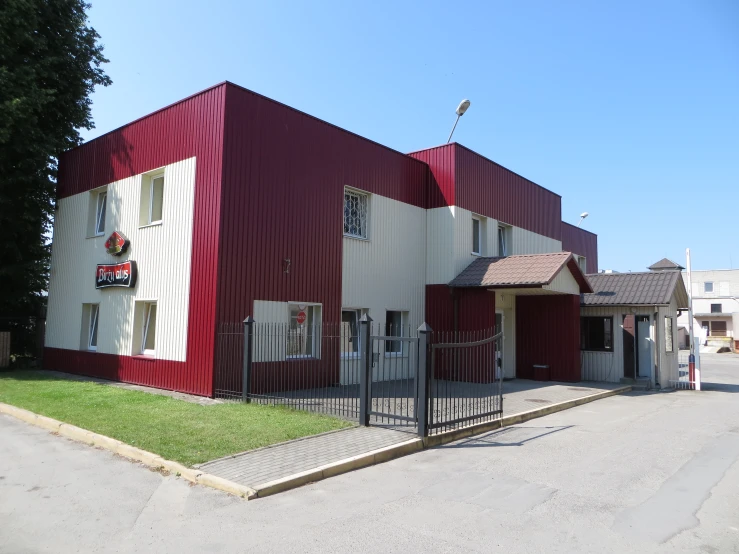 the building is painted red and white