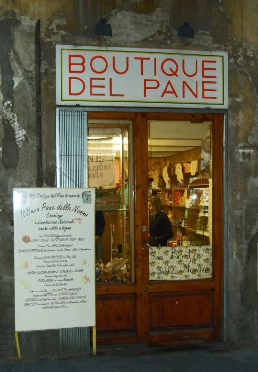 store sign in french displayed for customers on front