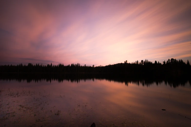 sunset over an area that has many water