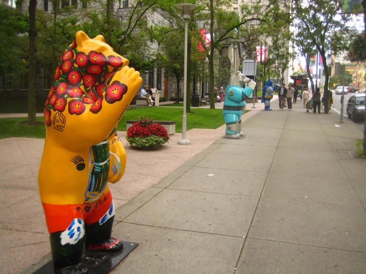 a person statue is decorated in colorful costume